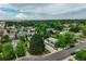 Residential area with a backdrop of city skylines and abundant green spaces at 1231 W Radcliff Ave, Englewood, CO 80110