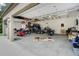 A detached multi-car garage with ample parking space that has been converted to entertainment space at 1231 W Radcliff Ave, Englewood, CO 80110