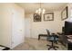 A clean, carpeted office space with natural light at 1231 W Radcliff Ave, Englewood, CO 80110