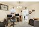 Office space with desk and view into the kitchen at 1231 W Radcliff Ave, Englewood, CO 80110