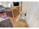 View of the staircase descending to the basement from the main level at 1231 W Radcliff Ave, Englewood, CO 80110