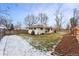 Spacious backyard with wood fence and landscaping at 551 E Caley Dr, Centennial, CO 80121