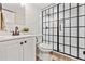 Basement bathroom with white subway tile and glass shower at 551 E Caley Dr, Centennial, CO 80121