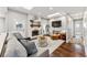 Living room with hardwood floors, fireplace and comfortable seating at 551 E Caley Dr, Centennial, CO 80121