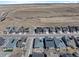 Bird's-eye view of a neighborhood featuring uniform homes with mountain backdrop, conveying community and location appeal at 8187 Mount Kataka St, Littleton, CO 80125