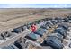 An aerial view captures a modern residential neighborhood with similar houses, highlighting community living and location at 8187 Mount Kataka St, Littleton, CO 80125