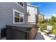Backyard patio featuring a hot tub with outdoor seating, perfect for relaxation and enjoying the fresh air at 7234 S Kellerman Way, Aurora, CO 80016