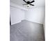 Bright bedroom with plush carpeting and ceiling fan offers plenty of space, and a large closet for ample storage at 7195 S Yantley Way, Aurora, CO 80016