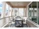 Cozy covered patio with outdoor dining table and seating, providing an ideal space for relaxation and entertaining at 7195 S Yantley Way, Aurora, CO 80016