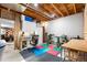 Functional basement workspace with ample storage, workbench, and good lighting for various projects and hobbies at 8662 Kim Ct, Parker, CO 80134