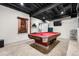 Recreational area featuring a pool table, ideal for entertaining guests and enjoying leisure time at 8662 Kim Ct, Parker, CO 80134