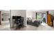 Versatile room featuring a work space plus a sleeping area with access to an outdoor patio at 8662 Kim Ct, Parker, CO 80134