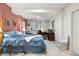 Serene bedroom retreat with soft colors, a comfortable bed, and a dedicated workspace for ultimate relaxation and productivity at 8662 Kim Ct, Parker, CO 80134