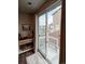 Sliding glass door leading to a backyard patio and view of neighbor's homes at 3074 Distant Rock Ave, Castle Rock, CO 80109