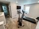 Upper level exercise room with stationary bike and treadmill at 3074 Distant Rock Ave, Castle Rock, CO 80109