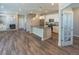 Modern kitchen features stainless steel appliances, granite countertops, and island for dining at 3074 Distant Rock Ave, Castle Rock, CO 80109