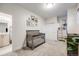 Bright Bedroom featuring a crib, closet space, and a view of the ensuite bathroom at 2922 W 26Th Ave # 4, Denver, CO 80211