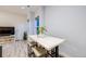 Dining area featuring a modern table with seating and plenty of natural light at 2922 W 26Th Ave # 4, Denver, CO 80211