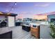 Cozy rooftop deck with inviting seating around a fire pit, perfect for outdoor relaxation at 2922 W 26Th Ave # 4, Denver, CO 80211