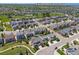 An aerial view showcasing the neighborhood, the Fallbrook Farms Park, and the house at 3554 E 143rd Pl at 3554 E 143Rd Pl, Thornton, CO 80602
