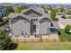 Aerial view of backyard featuring a deck and spacious fenced yard at 3554 E 143Rd Pl, Thornton, CO 80602