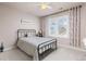 Cozy bedroom with neutral colors, shutters, ceiling fan, and a comfortable atmosphere at 3554 E 143Rd Pl, Thornton, CO 80602