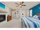 Spacious main bedroom boasts a fireplace, wood dressers, and ensuite bathroom access at 3554 E 143Rd Pl, Thornton, CO 80602