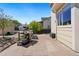Backyard has a gas grill, striped beanbag seating, and lush landscaping at 11370 Iola St, Commerce City, CO 80640