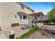 A spacious stamped concrete patio with a pergola and outdoor seating offer comfortable relaxation at 11370 Iola St, Commerce City, CO 80640