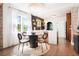 Bright dining area adjacent to the updated kitchen at 4425 King St, Denver, CO 80211