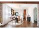 Modern dining area with a round table and four chairs at 4425 King St, Denver, CO 80211