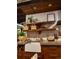 Modern kitchen with concrete countertops and a farmhouse sink at 4425 King St, Denver, CO 80211