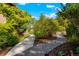 Curved walkway with landscaping and exterior lighting at 4425 King St, Denver, CO 80211