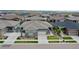 Aerial view of home with a well-manicured front yard and landscaping at 1962 Canyonpoint Ln, Castle Pines, CO 80108