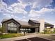 Exterior view of the community clubhouse with modern architectural details at 1962 Canyonpoint Ln, Castle Pines, CO 80108