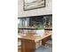 Dining area with a modern fireplace feature and comfortable seating at 1962 Canyonpoint Ln, Castle Pines, CO 80108