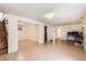 Spacious basement area with tile floors and access to other rooms at 2615 S Laredo Ct, Aurora, CO 80013