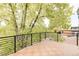 Spacious balcony surrounded by lush trees at 4322 Quivas St, Denver, CO 80211