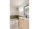 Stylish bathroom featuring tiled wall detail, modern fixtures, and a walk in shower at 4322 Quivas St, Denver, CO 80211