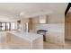 Spacious kitchen with stainless appliances, a center island, and modern cabinetry for a sleek design at 4322 Quivas St, Denver, CO 80211
