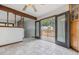 The dining area features tiled floors, a ceiling fan, and access to a wood deck at 11035 E Parker Rd, Parker, CO 80138