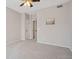 Bedroom with neutral walls, carpet flooring, and multiple closets at 1632 W Canal Cir # 924, Littleton, CO 80120