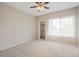 Spacious bedroom with neutral carpet, a ceiling fan and good natural light at 1632 W Canal Cir # 924, Littleton, CO 80120