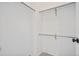Walk-in closet with metal shelving and bars at 1632 W Canal Cir # 924, Littleton, CO 80120