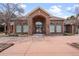 Attractive brick clubhouse with large windows and manicured landscape in front at 1632 W Canal Cir # 924, Littleton, CO 80120