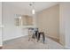 Dining area with glass table, stylish seating, and contemporary decor at 1632 W Canal Cir # 924, Littleton, CO 80120