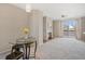 Inviting living room featuring a fireplace, balcony, and a modern light fixture at 1632 W Canal Cir # 924, Littleton, CO 80120