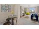 Bright living room featuring a fireplace, balcony access, and modern decor at 1632 W Canal Cir # 924, Littleton, CO 80120