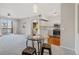 Open floor plan with living, dining, and kitchen areas, filled with natural light at 1632 W Canal Cir # 924, Littleton, CO 80120