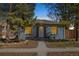 Charming home with mature trees and inviting curb appeal at 2570 Jay St, Edgewater, CO 80214